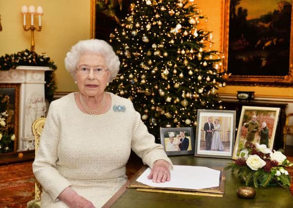 Queen Elizabeth II sits after recording her Christmas Day broadcast to the Commonwealth. Picture: Getty