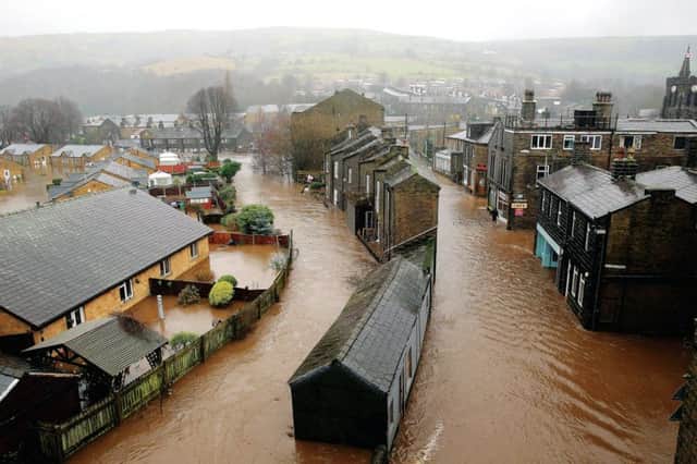 The River Calder burst its banks and flooded Mytholmroyd, West Yorkshire. Picture: Christopher Furlong/Getty