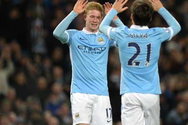 David Silva congratulates Kevin De Bruyne after the Belgian midfielder scored City's fourth. Picture: Getty Images