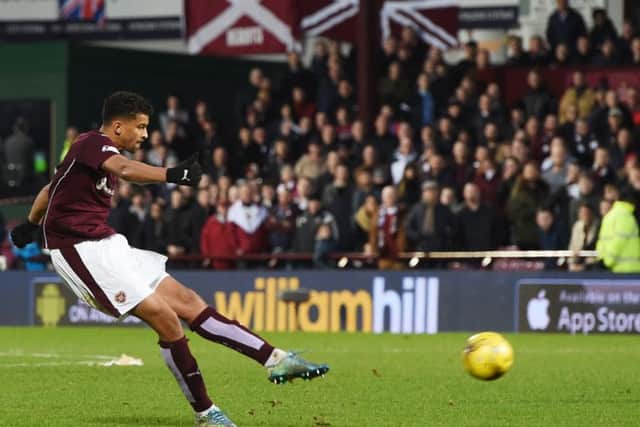 Osman Sow strikes the ball from distance as his late goal earns a point for Hearts. Picture: SNS Group
