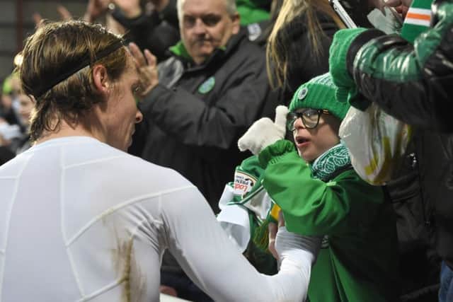 Stefan Johansen gives his shirt to Jay Beatty at the final whistle. Picture: SNS Group