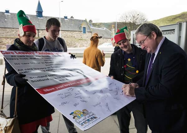 Angus MacDonald MSP with care leavers as they called for a better Christmas. Picture: Stephanie Ray