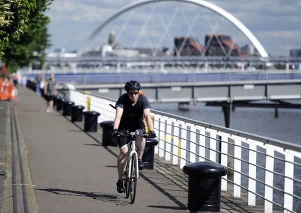 Cycling, walking and safe routes funding for local authorities will be cut by £2.1 million. Picture: John Devlin