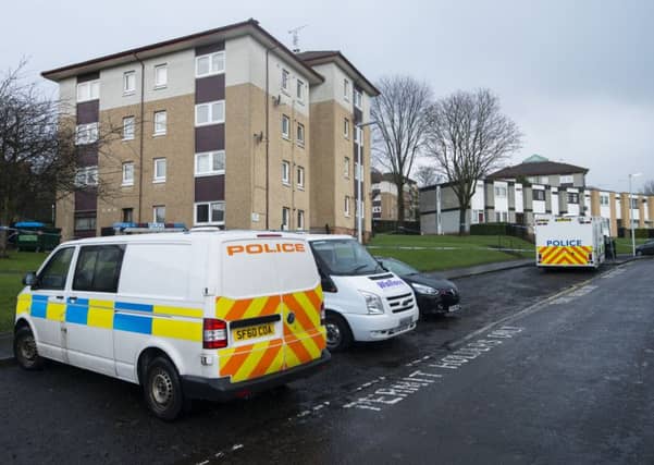 Police at the scene of the stabbing in Thurso Cresent, Dundee. Picture: Alan Richardson
