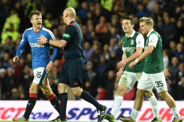 Rangers' Andy Halliday (left) is sent off after clashing with Fraser Fyvie (not pictured). Picture: SNS