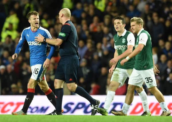 Rangers' Andy Halliday (left) is sent off after clashing with Fraser Fyvie (not pictured). Picture: SNS