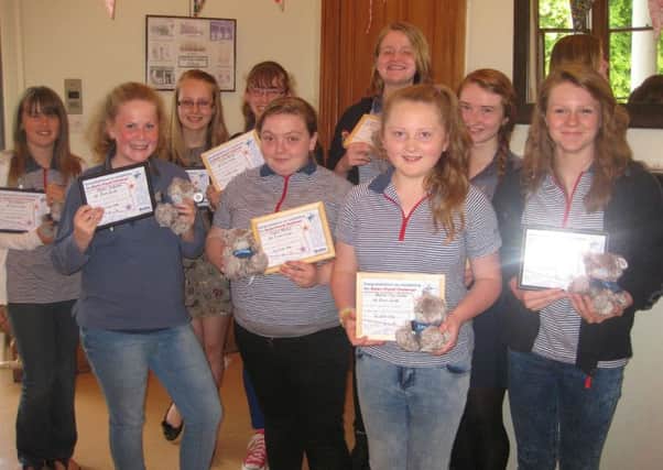 Girls from 1st Duns Guides working on The Baden-Powell Challenge Award, the highest award a Guide can achieve. Picture: Contributed