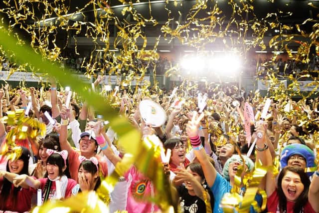 Tokyo residents cheer as the city is named host of the 2020 Olympics. Picture: Adam Pretty/Getty Images