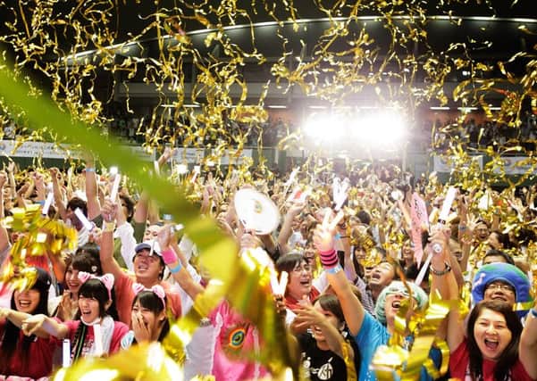 Tokyo residents cheer as the city is named host of the 2020 Olympics. Picture: Adam Pretty/Getty Images