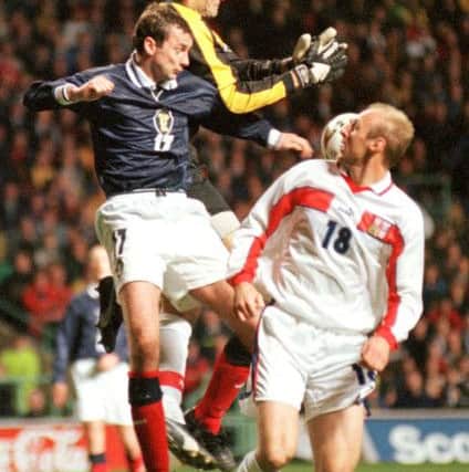 Srnicek in action against Don Hutchison during a Scotland match with the Czech Republic in March1999. Picture: Ian Rutherford