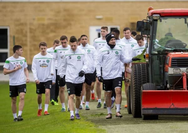 Tractor Bhoys: Kris Commons leads the Celtic players to training at Lennoxtown. The squad could be bolstered in January. Picture: SNS