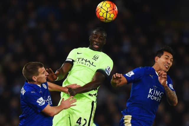 Yaya Toure of Manchester City rises above Leicesters Marc Albrighton and Leonardo Ulloa. Picture: Getty Images