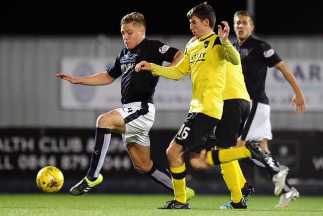 Peter Grant in action for Falkirk. Picture: Michael Gillen