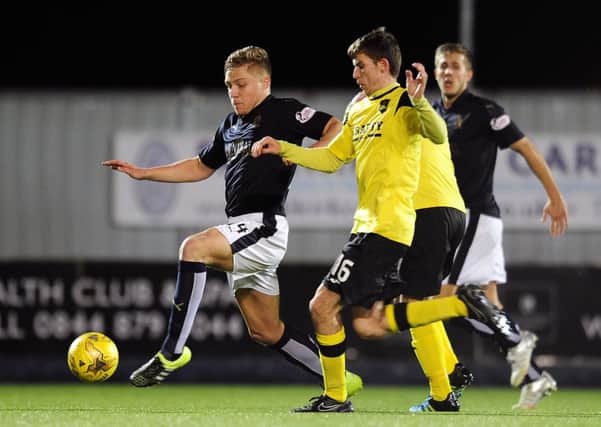 Peter Grant in action for Falkirk. Picture: Michael Gillen