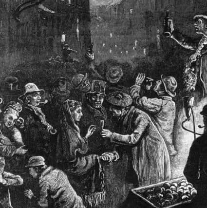 1876:  Celebrating New Year's eve in Edinburgh.  Photo by Hulton Archive/Getty Images.
