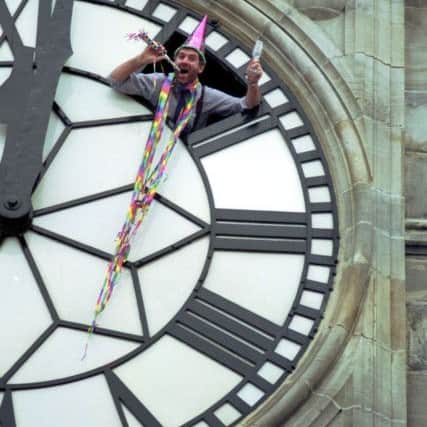 Engineer Archie Cunningham prepares to bring in the Edinburgh New Year by himself inside the Balmoral hotel clock on Hogmanay, December 1991.