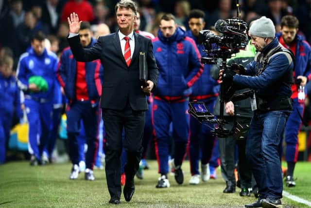 Louis van Gaal waves to the crowd before the Chelsea match. Picture: Clive Mason/Getty Images