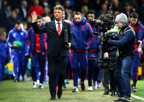 Louis van Gaal waves to the crowd before the Chelsea match.  Picture: Clive Mason/Getty Images
