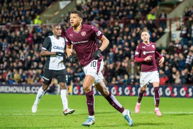 Osman Sow celebrates after putting Hearts 3-1 up from the penalty spot. Picture: Ian Georgeson