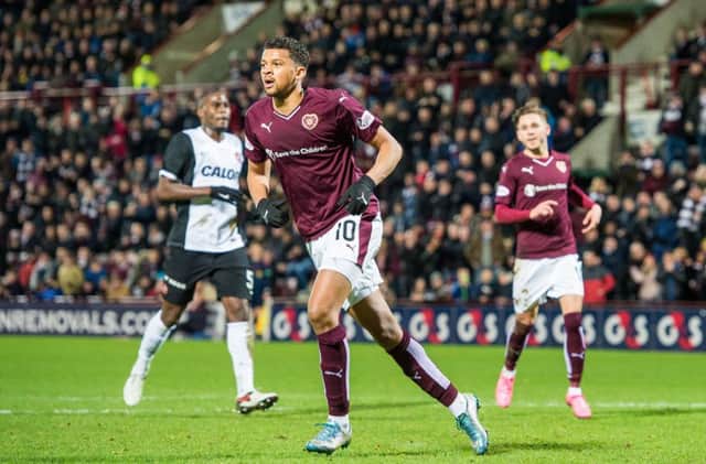 Osman Sow celebrates after putting Hearts 3-1 up from the penalty spot. Picture: Ian Georgeson