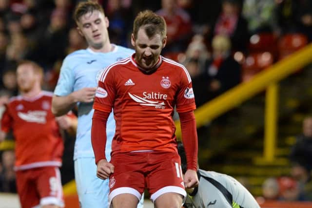 Frustration from Aberdeen's Niall McGinn as a chance passes by. Picture: SNS