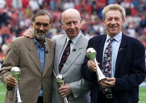 Law, the former Scottish international, has received a CBE. Pictured in 2000 alongside George Best (left) and Sir Bobby Charlton. Picture: PA