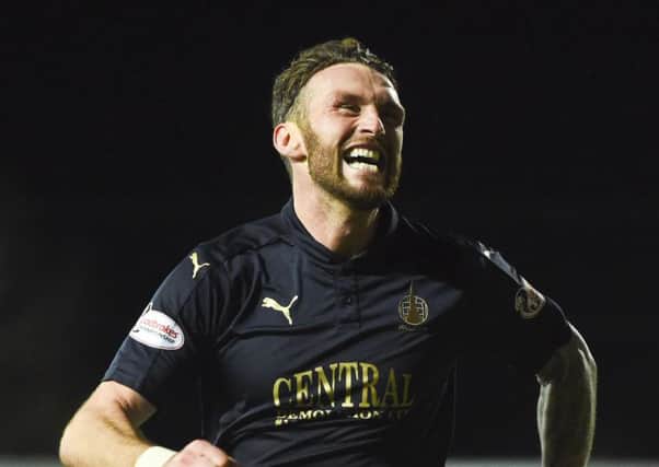 Falkirk's Lee Miller celebrates after making it 2-0. Picture: SNS