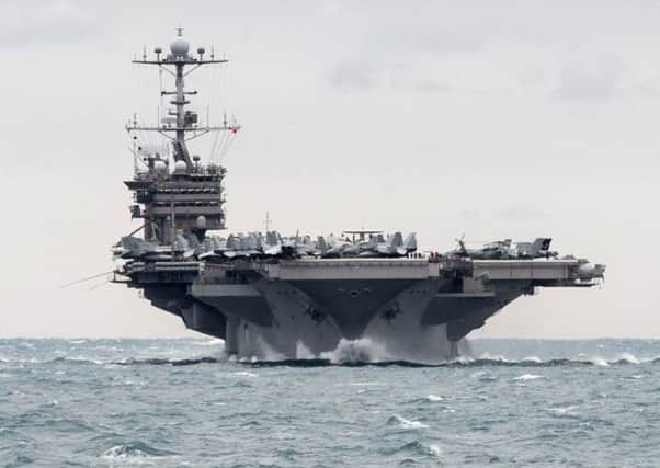 USS Harry Truman aircraft carrier in the Strait of Hormuz. Picture: AP