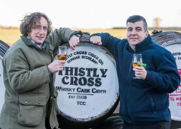 Thistly Cross cider maker Peter Stuart, left, with Asda's Brian O'Shea. Picture: Ian Georgeson