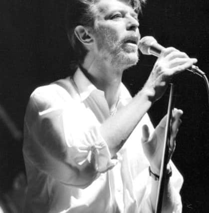 A bearded Bowie plays with his band Tin Machine at the Livingston Forum in 1989. Picture: Joe Steele