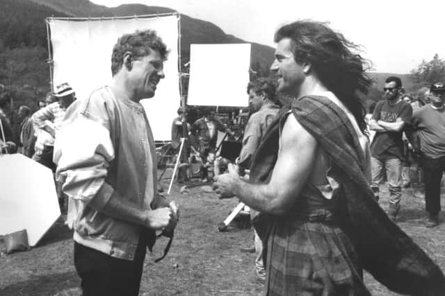 Mel Gibson, right, in costume as William Wallace on the set of Braveheart