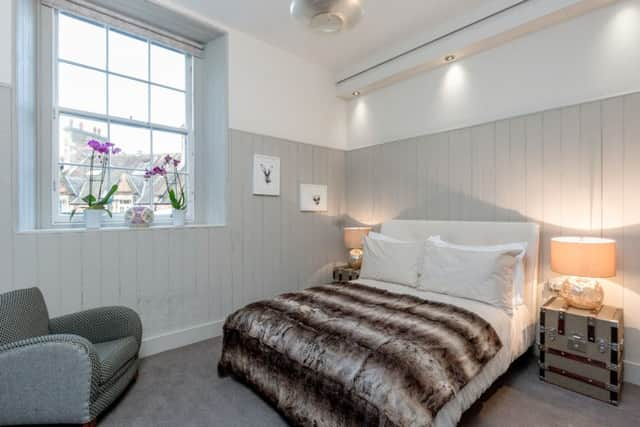 The bedroom with original panelling