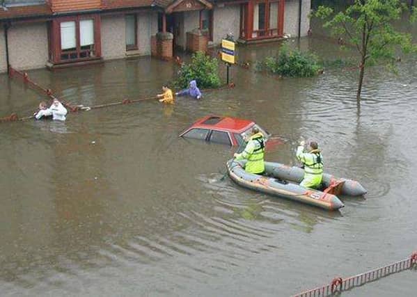 Many homes were uninhabitable after the damage wrought by the 2002 floods. Image: Glasgow City Council/Scottish Water