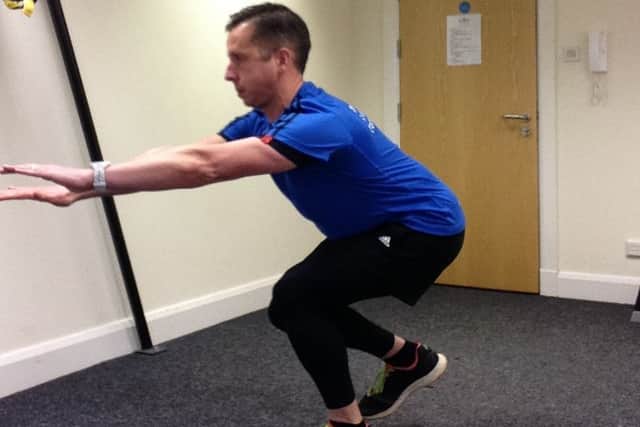 Personal trainer Stephen Bonthrone demonstrates the single-leg squat as a strengthening technique to improve ankle muscles and balancing ability. Image: Stephen Bonthrone