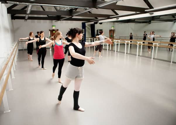 A ballet class in progress