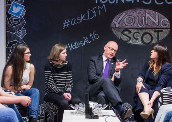 Deputy First Minister John Swinney meets prospective first time voters. Picture: Ian Georgeson