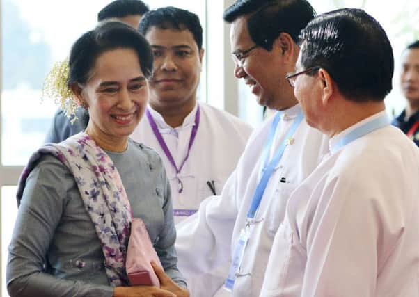 Aung San Suu Kyi arrives for the meeting in Naypyitaw. Picture: AP