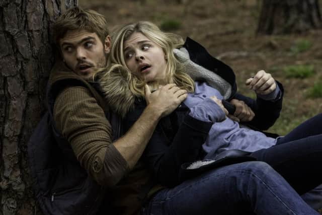 Alex Roe, left, and ChloÃ« Grace Moretz star in Columbia Pictures' The 5th Wave