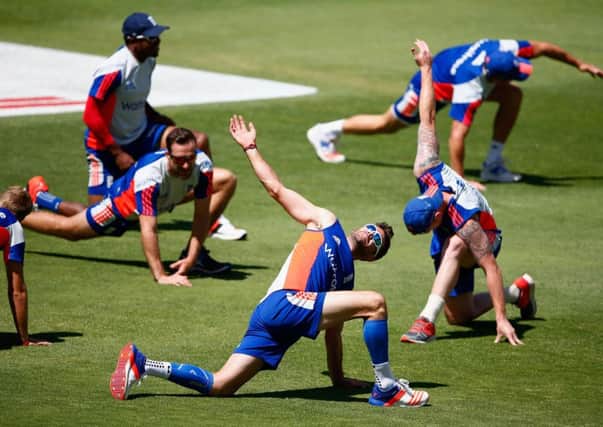 England paceman James Anderson, centre, stretches during a training session at the Wanderers Stadium in Johannesburg ahead of the Third Test which starts today. Picture: Getty