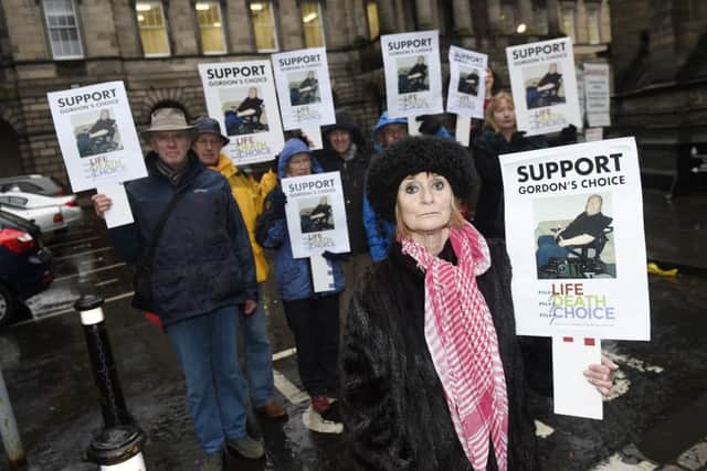 Shiela Duffy from Friends At The End (FATE) leads a demonstration outside the Scottish Parliament in December. Picture: Greg Macvean