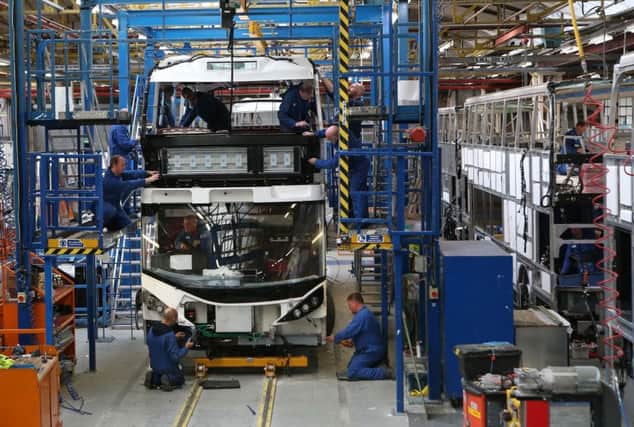 The green buses are made by Scots manufacturers Alexander Dennis. Picture: PA