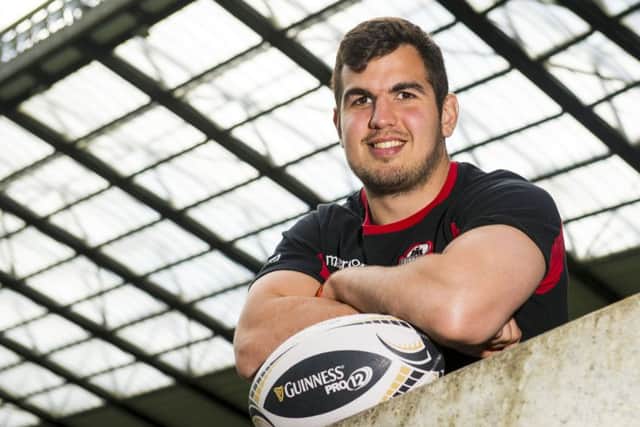 Stuart McInally has signed a new deal until 2018 and was named captain of this weekend's side. Picture: SNS