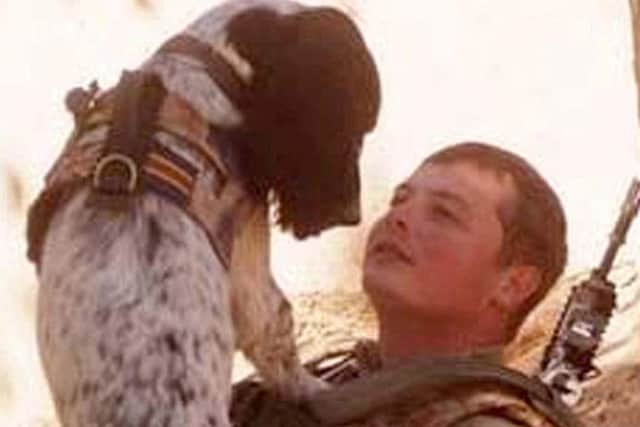 Lance Corporal Liam Tasker and his Springer spaniel Theo, who died just hours after his handler