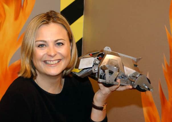 Phillipa Forrester with a robot from Robot Wars. The show, off-air for 12 years, is to make a return to TV screens. Picture: PA