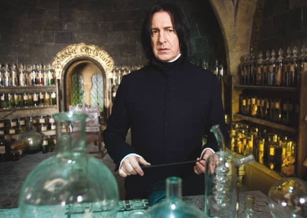 Alan Rickman as Severus Snape