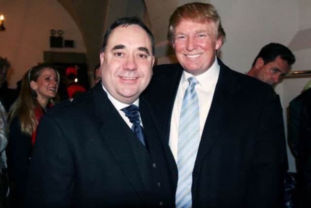 Happier times:  Alex Salmond  and Donald Trump pose for pictures at Tartan Week in New York in 2006. Picture: Reuters