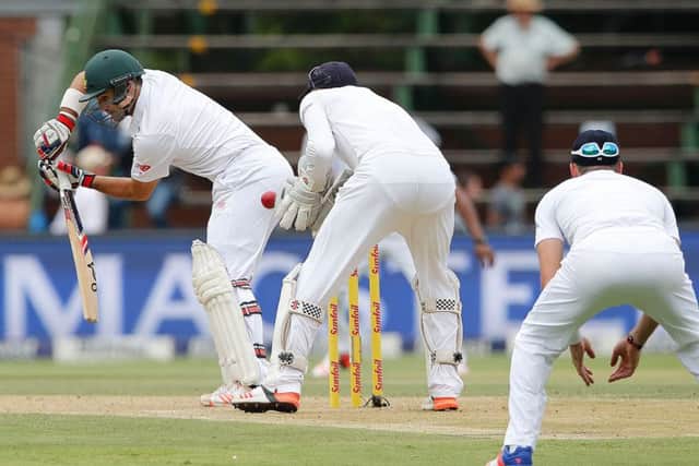 Jonny Bairstow takes the catches South Africa batsman Dean Elgar off the bowling of Moeen Ali. Picture: AFP/Getty Images