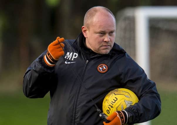 Dundee United manager Mixu Paatelainen during training yesterday. Picture: SNS