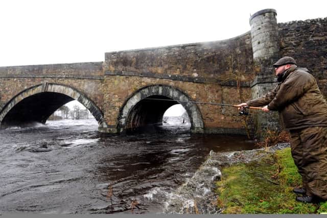 Anglers gather on the banks of the River Tay in January last year. Picture: Lisa Ferguson