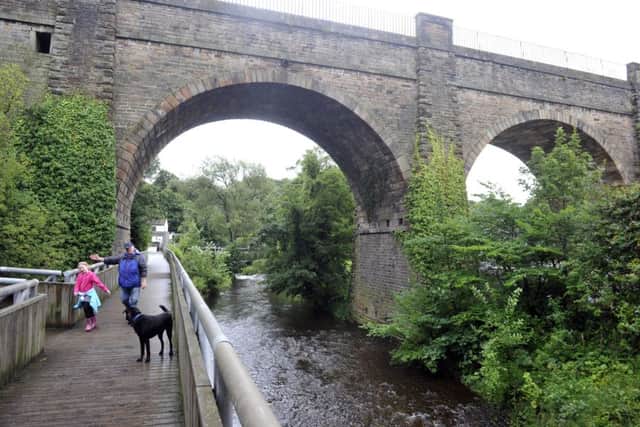 The Water of Leith passes under the Union Canal aqueduct in Slateford. Picture: Dan Phillips
